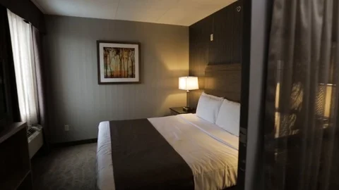 Hotel Room With Orange Lamps Stock Footage 124082416