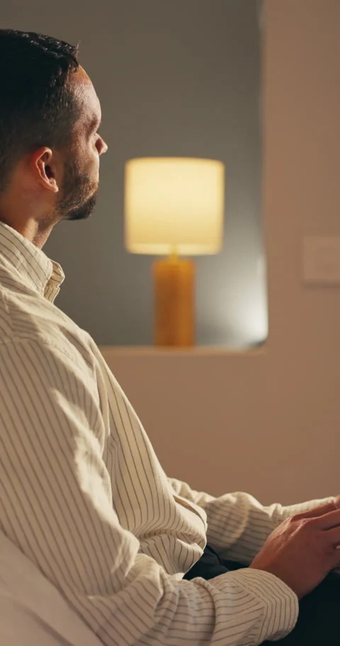 Hotel room, thinking and man with laptop for remote work, problem solving or Stock Footage 335388128
