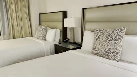 Hotel Room with Two Neatly Made Beds Vídeos de archivo 344991249