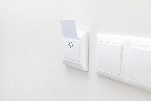 Hotel White Key Card Reader With Card For Powering Electricity. Hotel Key Card Stock Photos