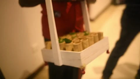 Hotel worker serve something in decorative objects in Sri Lanka. Stock Footage 174677726