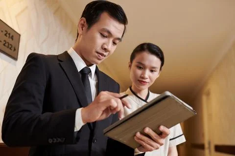 Hotel Workers Planning Work Stock Photos
