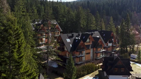 Hotels Nestled Within A Dense Forest Of Coniferous Trees In Jaszczurówka Vídeo Stock 332684383