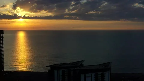 Hotels by the sea during sunset Stock Footage 152374367