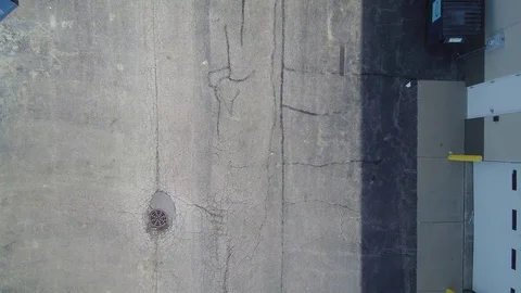 Hotrod Warehouse Top Down Drone Footage Stock Footage 85036580