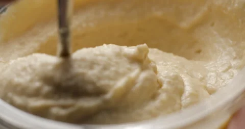 Houmous preparation with spoon close-up slow motion Stock-Footage 280520911