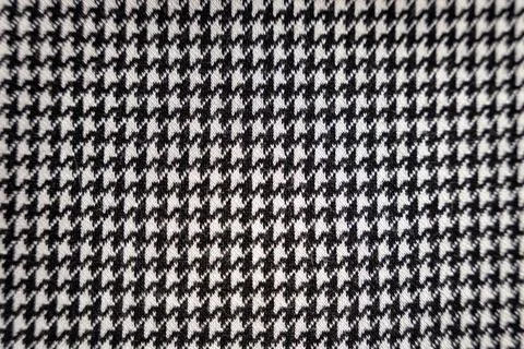 Houndstooth black and white checks pattern textile texture background Stock Photos