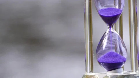 Hourglass on the background of the river 스톡 동영상 277476468