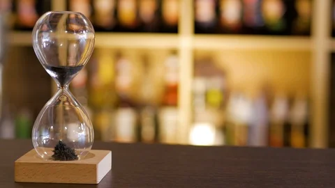 Hourglass in the cafe on the table Stock Footage 105646536