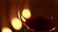 Hourglass with candles reflections (close up) HD Footage