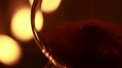 Hourglass with candles reflections (macro) Stock Footage 8683720