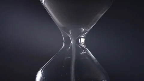 Hourglass close up on a black background. Time concept. Stock Footage 130251836