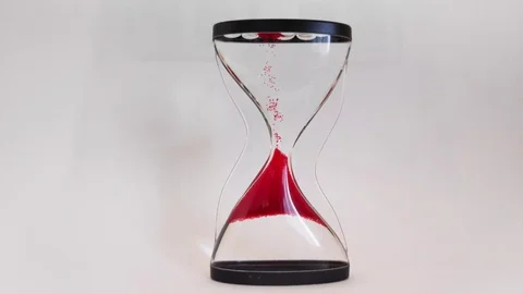 Hourglass counting time backwards Stock Footage 113424612