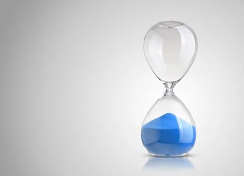 Hourglass on gray background Stockfoto's