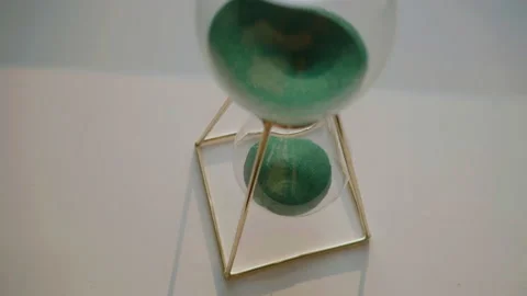 Hourglass with green sand. Countdown Stock Footage 170636628