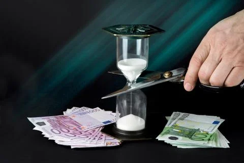 Hourglass with the lock. Stop the time concept. Stock Photos