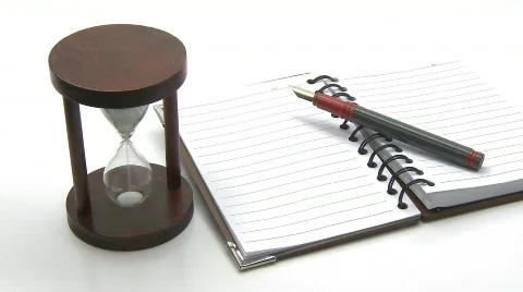 Hourglass pen notebook Stock Footage 467915