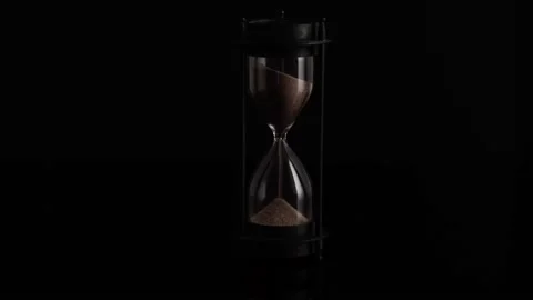 Hourglass, sand timer, sand clock time lapse video on the black background Stock Footage 162079216