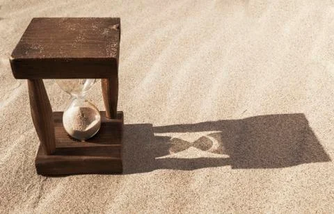 Hourglass with shadow Stock Photos