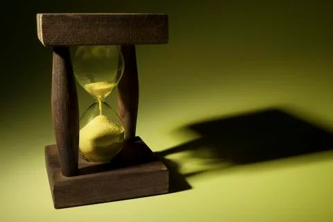 Hourglass with shadow Stock Photos