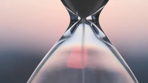 Hourglass in the sunset Stock Footage 241550853