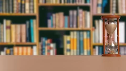 Hourglass on Table in Blurred Library Background 3d render.. Stock Photos