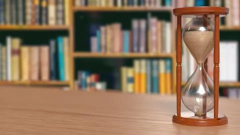 Hourglass on Table in Blurred Library Background 3d render.. Stock Photos