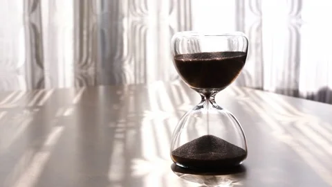 An hourglass on the table Video stock 169421096