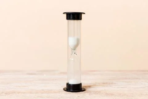 Hourglass on the table, sand clock as time passing concept for business dea.. Stock Photos