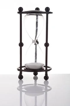 Hourglass on white background with reflection Stock Photos