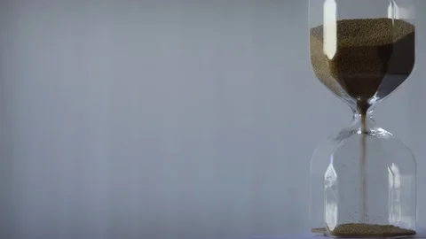 Hourglass on a white background for titration Stock Footage 124583727