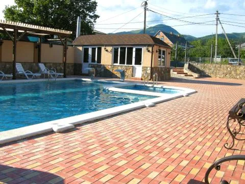 The house about pool Stock Photos