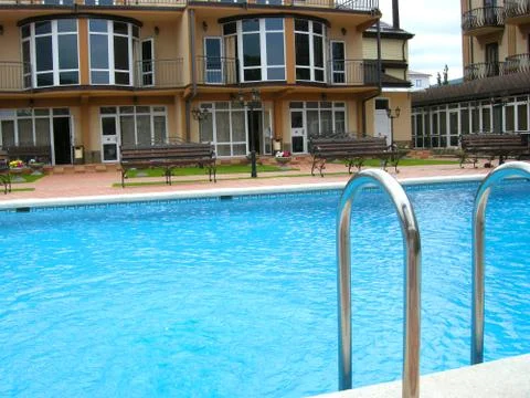 The house about pool Stock Photos