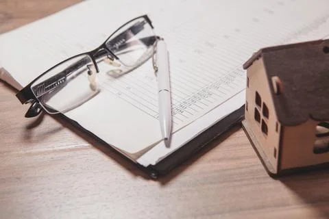 House and documents on the table Stock Photos
