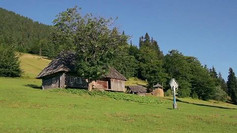 House and trees in the mountains Stock Footage 97652590
