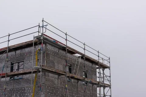 A house with attached thermal insulation on the outer facade Foto stock