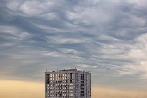 House on beautiful cloud background. Cloudscape. close up of clouds in the sky Stock Photos