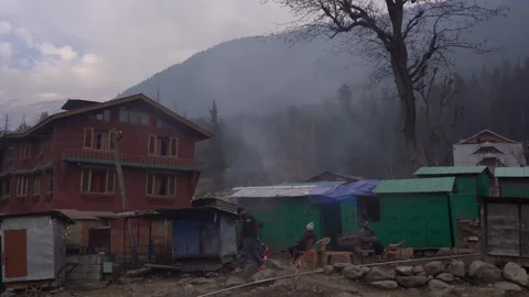 A House between the field of Hill in Pahalgam , Kashmir Stock Footage 283259326