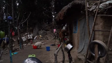 A House between the field of Hill in Pahalgam , Kashmir . Stock Footage 283264090