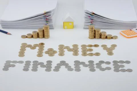 House is between pile overload paperwork with colorful paperclip Stock Photos