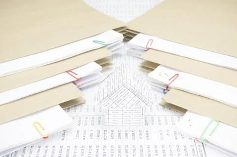 House between stack paperwork report with envelope Stock Photos