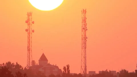 House between two towers in sunset Stock Footage 86427212