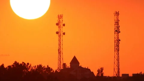 House between two towers at sunset Stock Footage 122612933