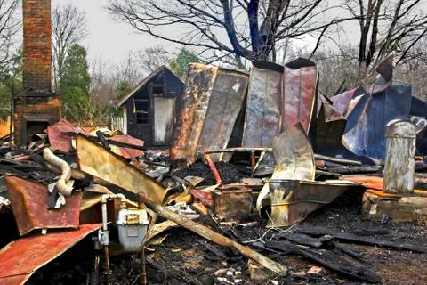 House Burned To The Ground, Fire Started In The Furnace Area Stock Photos