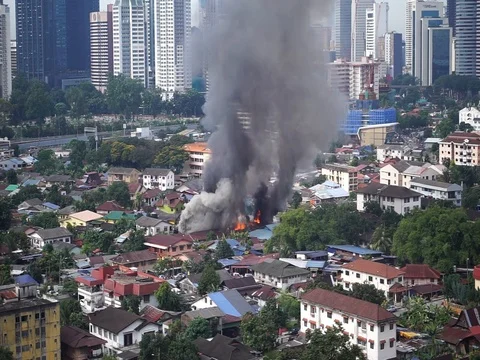 House is burning in the city Stock Footage 83867963