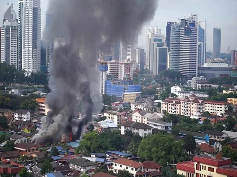 House is burning in the city Stock Footage 83867975