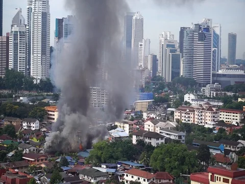 House is burning in the city Stock Footage 83867987