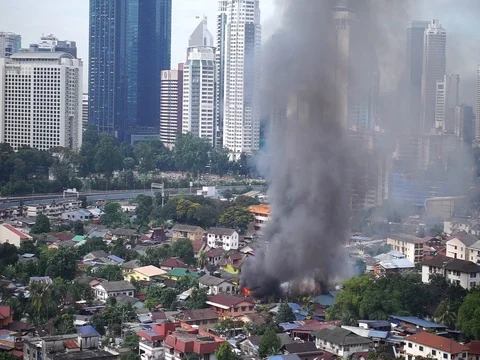 House is burning in the city Stock Footage 83867996