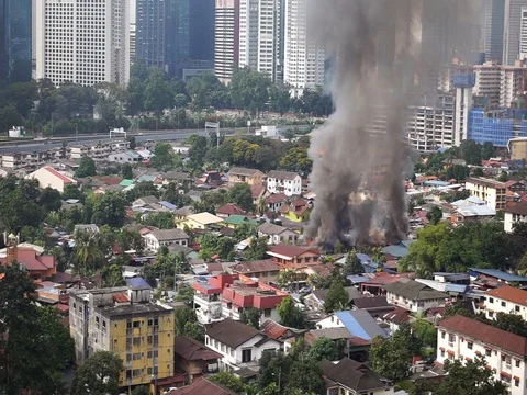 House is burning in the city Stock Footage 83868019