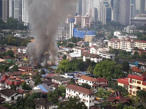 House is burning in the city Stock Footage 83868031